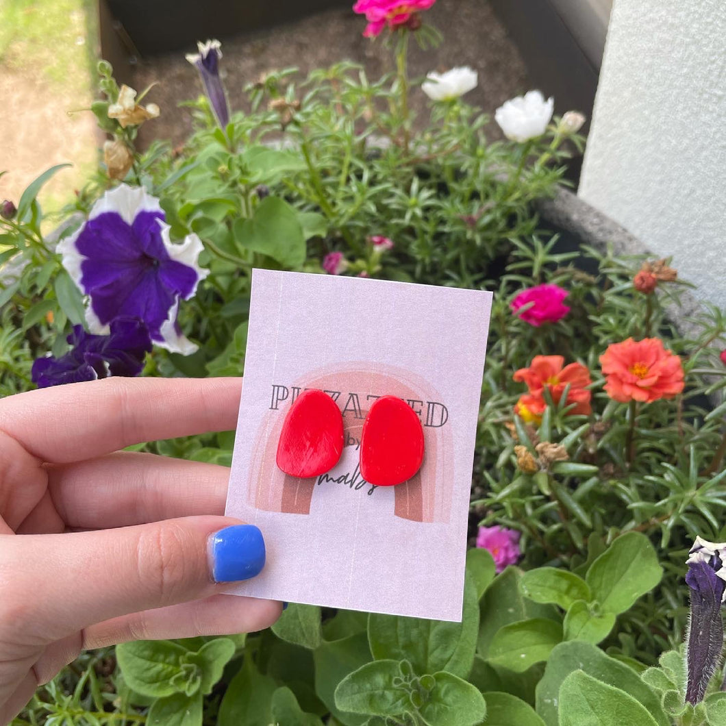 red small statement stud